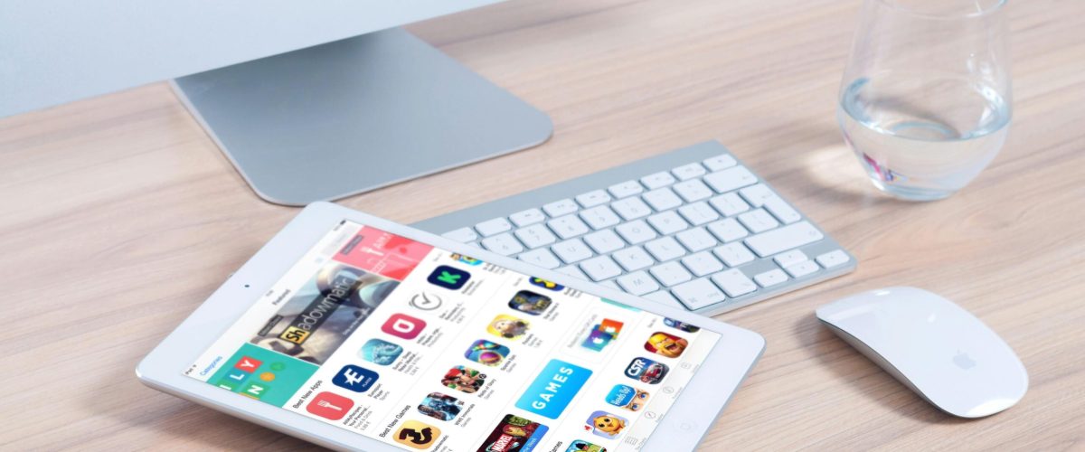 imac-apple-mockup-app-38544-38544 Sleek home office setup featuring an iMac and iPad showcasing apps.
